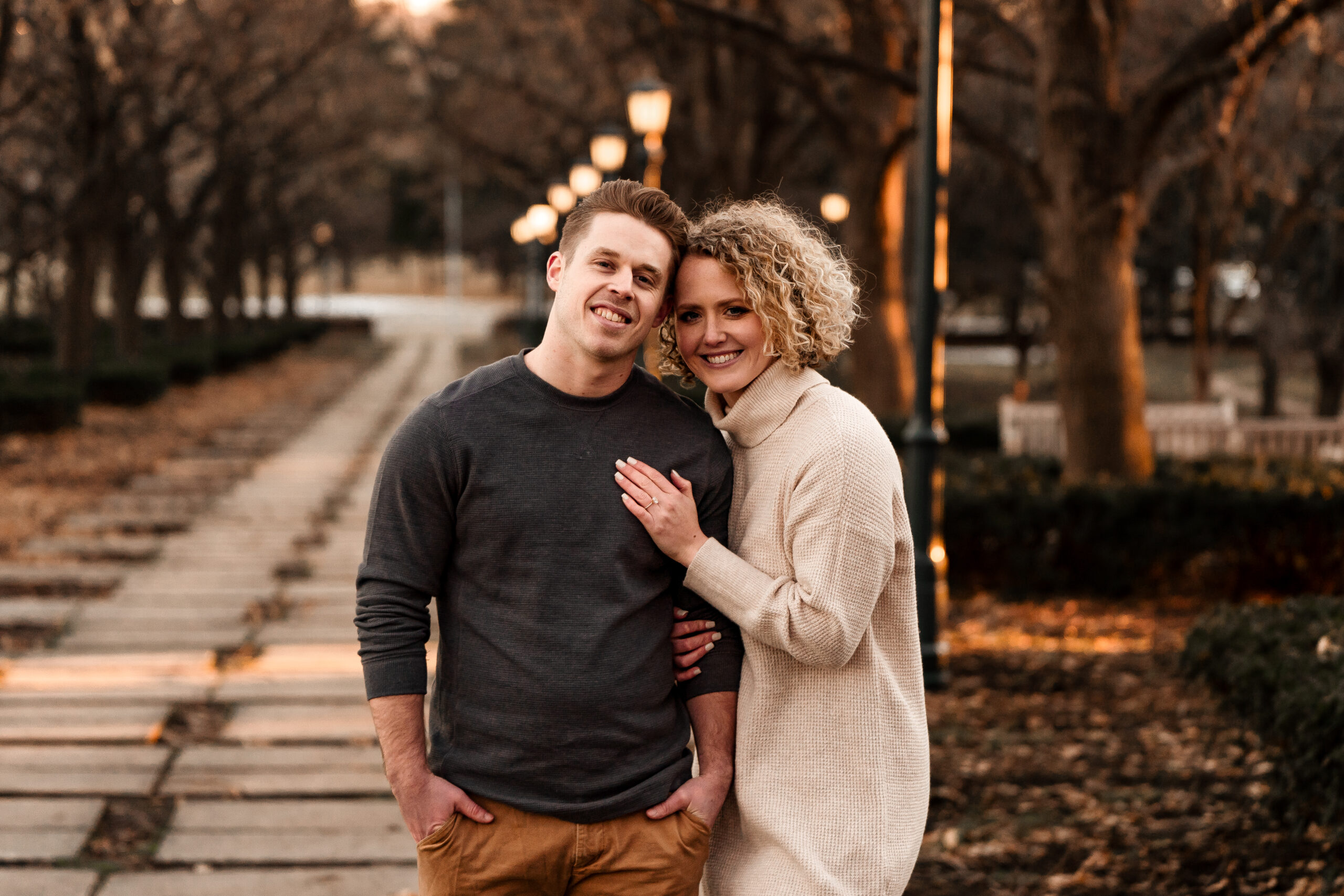 A couple at Nelson Atkins Museum for an Engagement Session in the winter