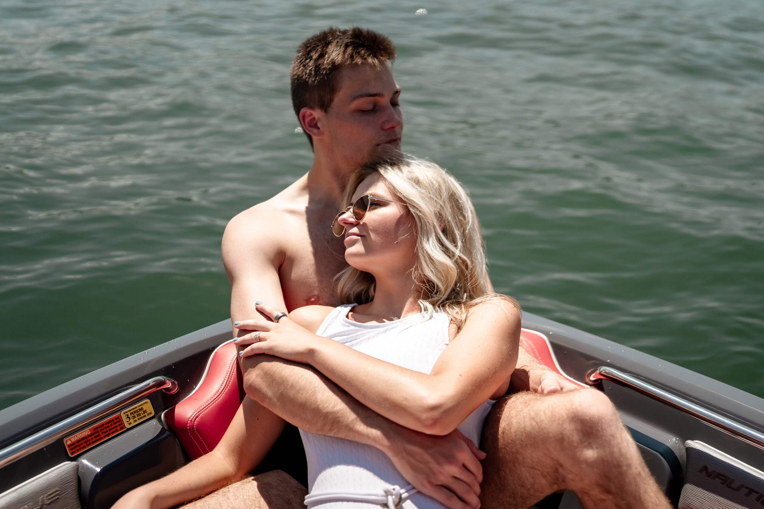 elopement couple on boat in lake winnebago